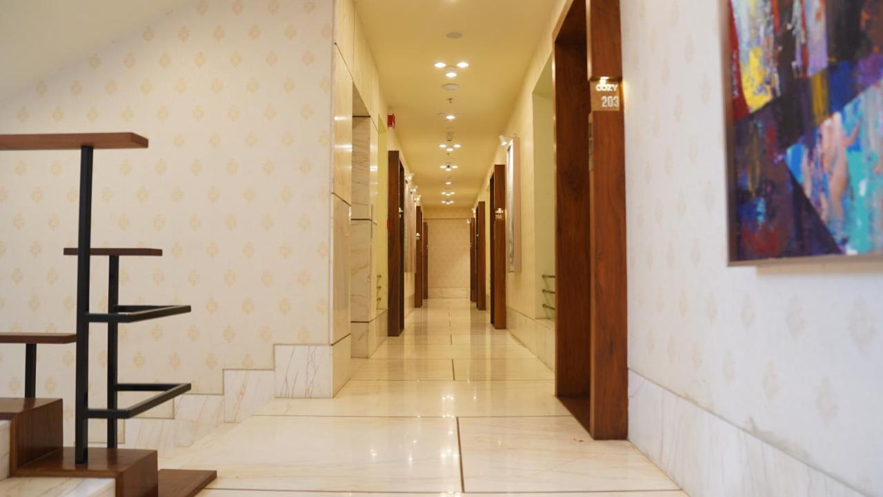 De Glance Hotel Surat Luaran gambar